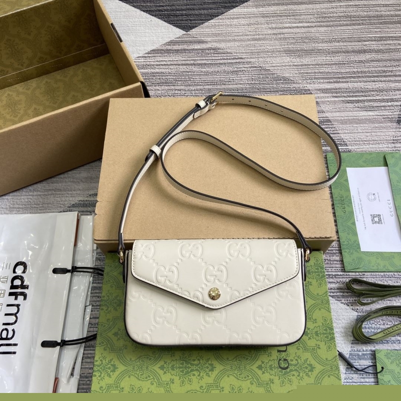 G*u*i satchel bags